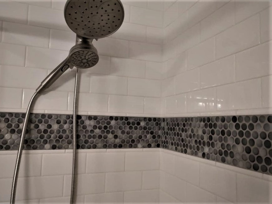 shower, glass tile, pebble tile, tile niche, glass tile border, white tile, subway tile, grey, brown